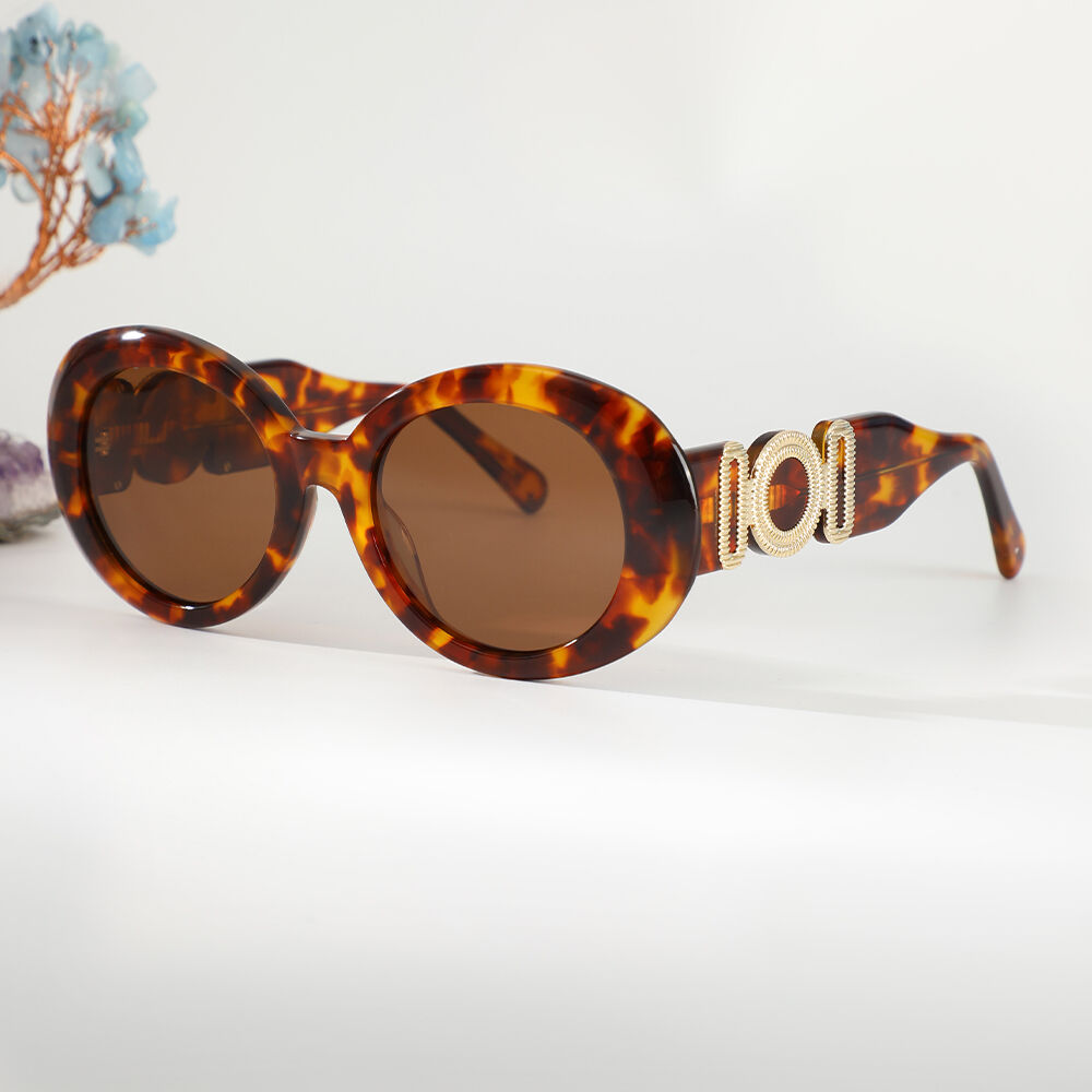 Tucci Cat Eye Tortoise Sunglasses